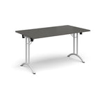 Folding table with grey top and white legs on a white background