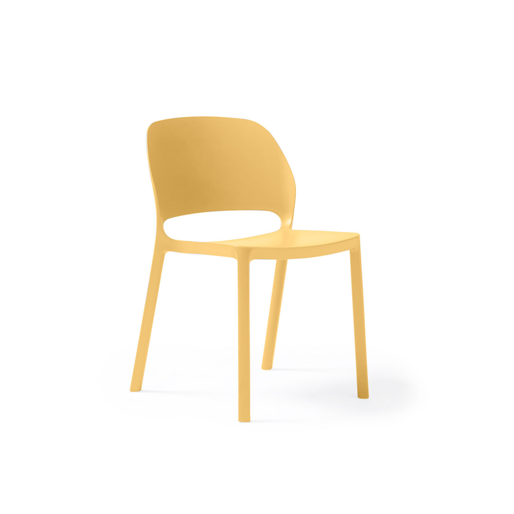 Yellow plastic chair on a white background