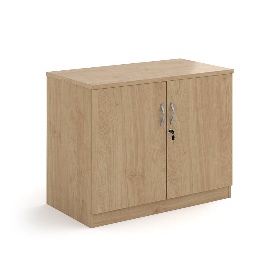 A two-door cabinet with a wood grain finish, featuring two vertical doors with slim silver handles and small lock keys, shown on a plain white background.