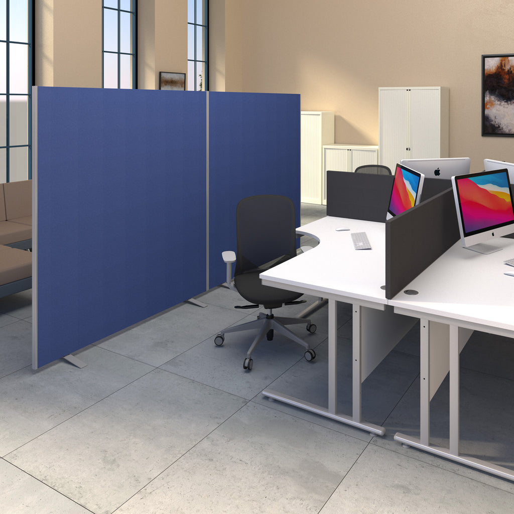 Modern office setup with a blue partition screen, desk, and chairs.