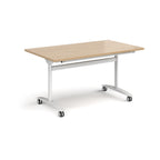 Rectangular table with a wood-effect top and white metal legs with castors on a white background