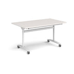 Rectangular table with a light grey top and white metal legs with castors on a white background