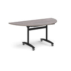 A semi-circular folding table with a grey wood-effect top and a black metal frame on castors, shown on a plain white background.