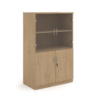 A light oak wood grain office bookcase with two lower cabinet doors, one open upper shelf, and two small wall-mount hooks on the back panel, shown on a white background.