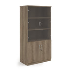A grey/brown wood grain office bookcase with two lower cabinet doors, one open upper shelf, and two small wall-mount hooks on the back panel, shown on a white background.