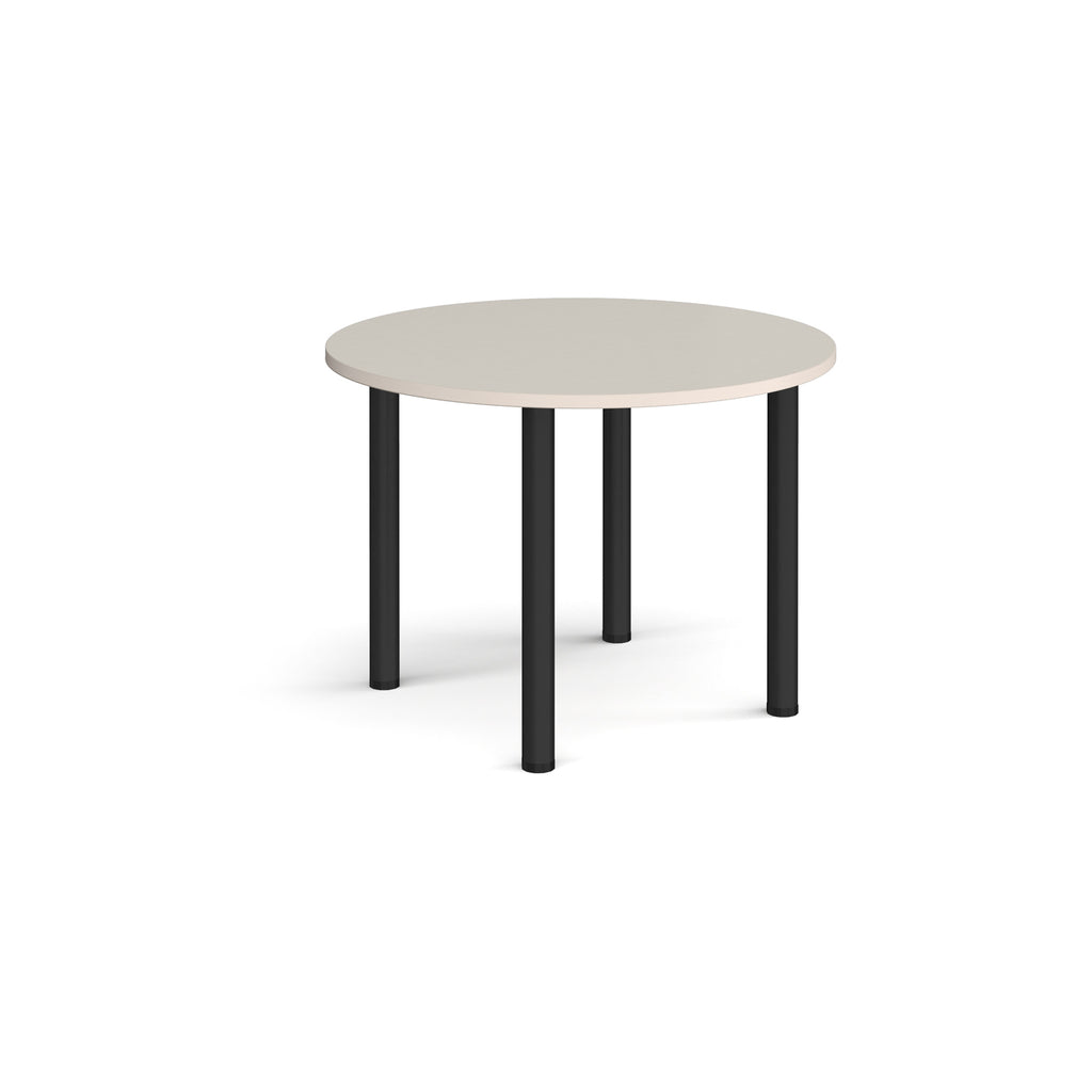 Round table with a light grey top and black legs on a white background