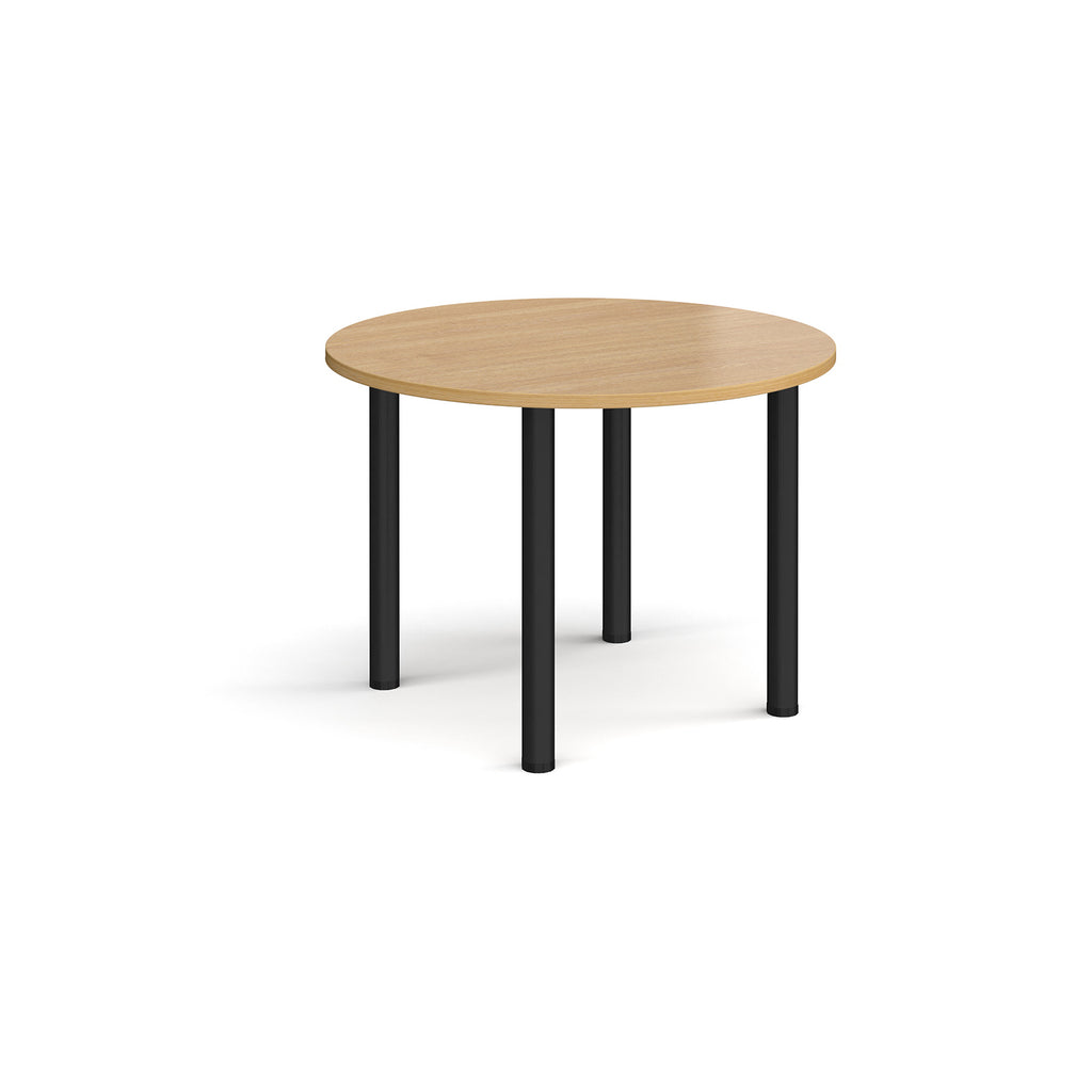 Round wooden table with black legs on a white background