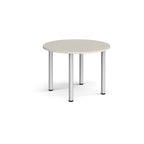 Round table with white surface and silver legs on a white background