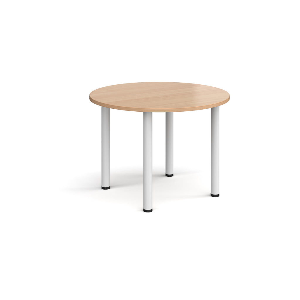 Round wooden table with white legs on a white background