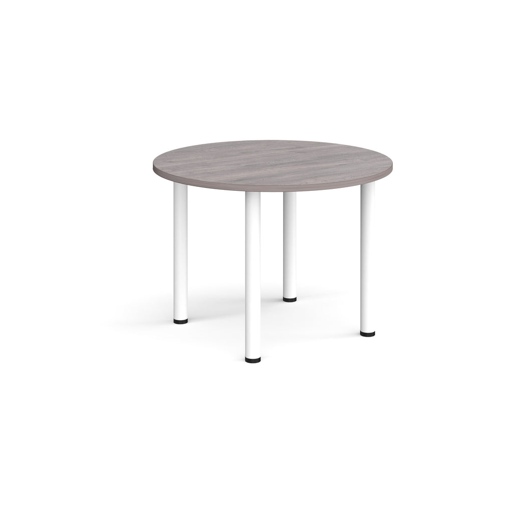 Round table with grey top and white legs on a white background