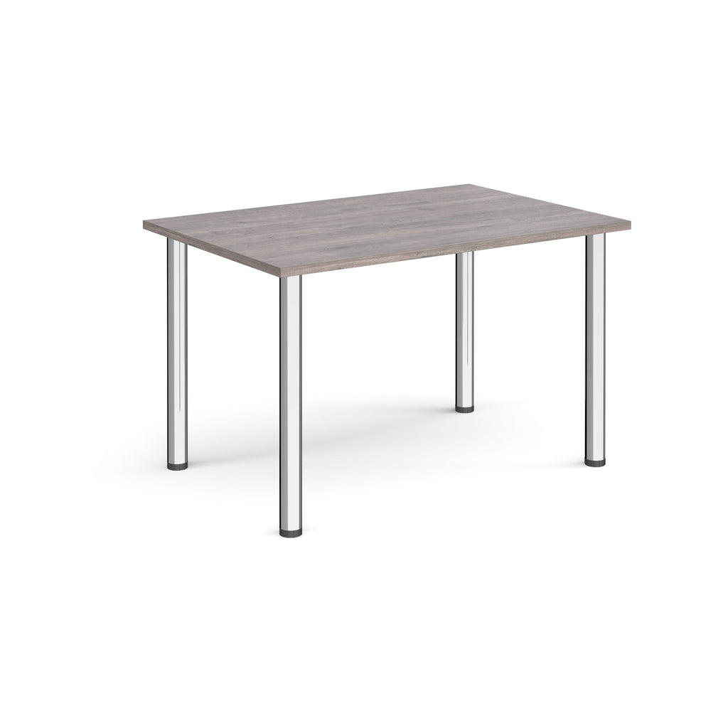 Rectangular table with a grey surface and metal legs on a white background