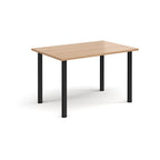 Rectangular table with a wooden top and black legs on a white background