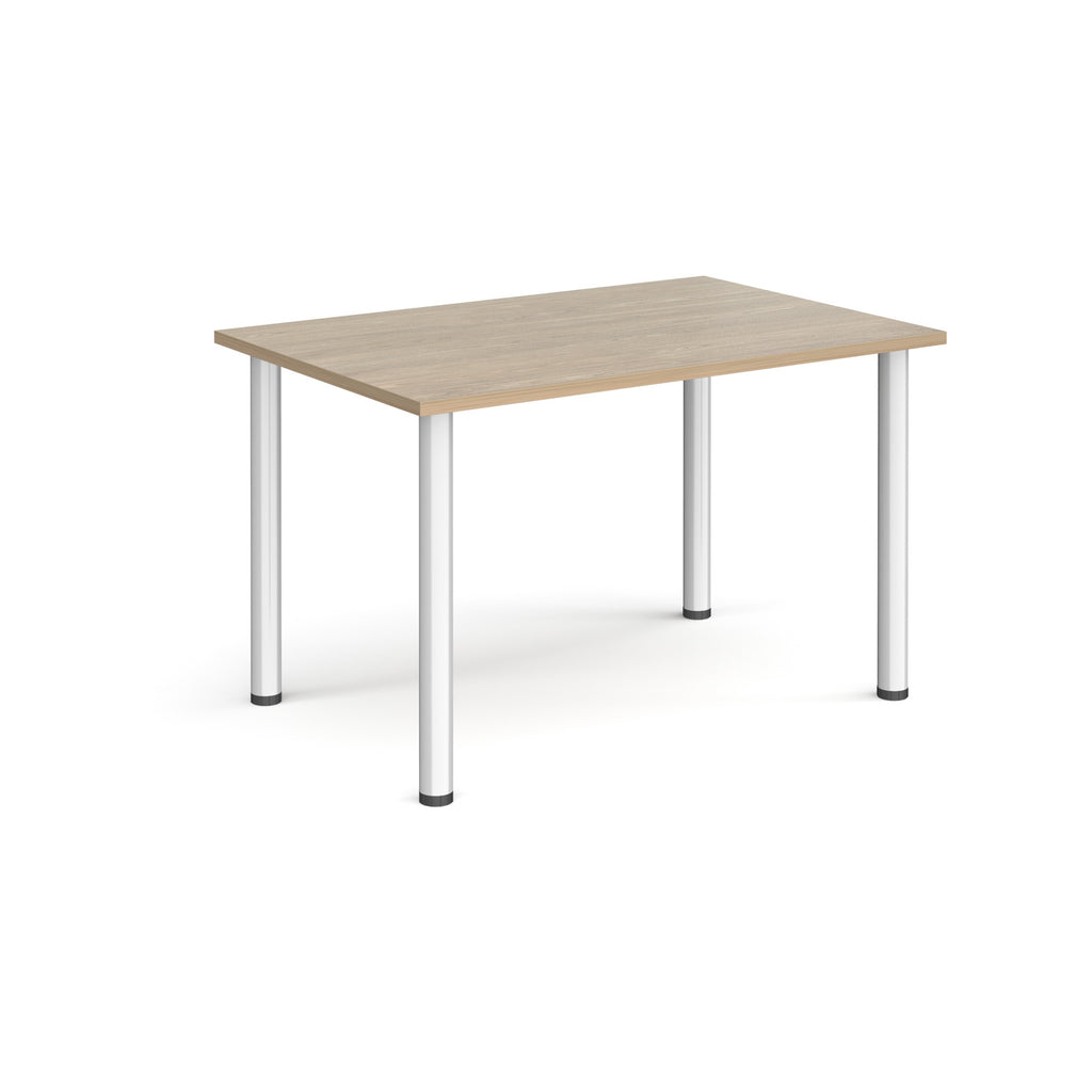 Wooden table with white legs on a white background