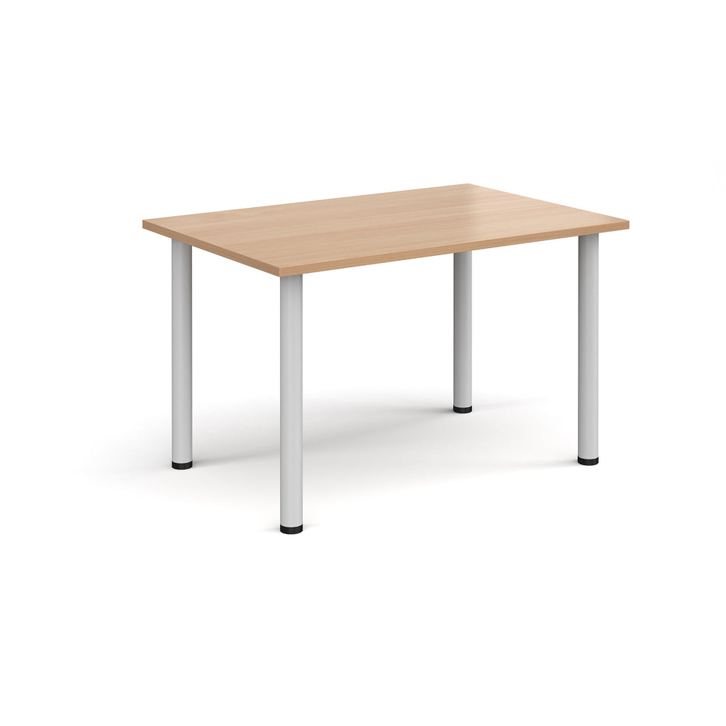 Rectangular wooden table with white legs on a white background