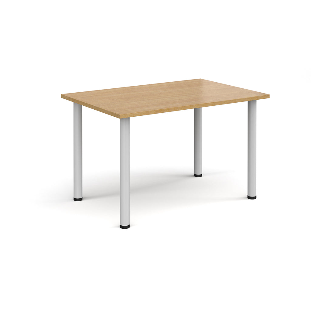 Wooden desk with white legs on a white background