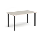 Rectangular table with a light grey top and black legs on a white background