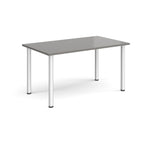 Rectangular table with grey top and silver legs on a white background