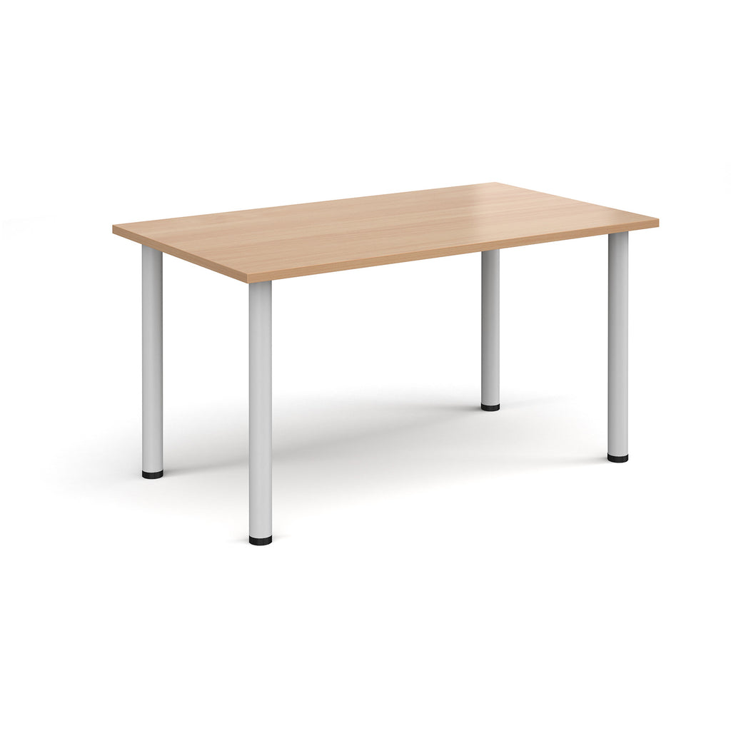 Rectangular table with wood-effect top and white legs on a white background