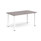 Rectangular table with grey wood-effect top and white legs on a white background