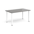 Rectangular desk with grey top and white legs on a white background
