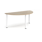 Half-moon shaped wooden table with white legs on a white background