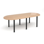 Oval table with wood-effect top and black metal legs on a white background