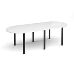Oval table with white top and black metal legs on a white background