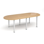 Oval table with wood-effect top and white metal legs on a white background