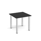 Black square table with chrome legs on a white background