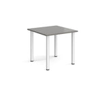 Square table with grey top and silver metal legs on a white background
