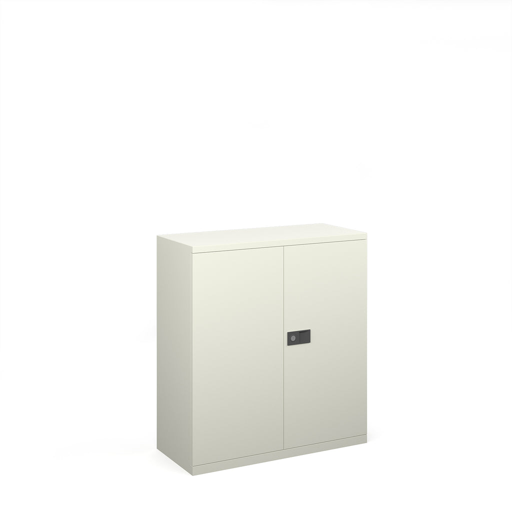 White storage cabinet with a black handle on a white background