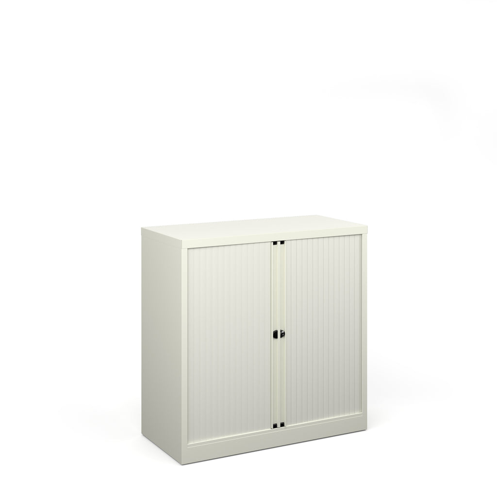 White cabinet with tambour doors on a white background