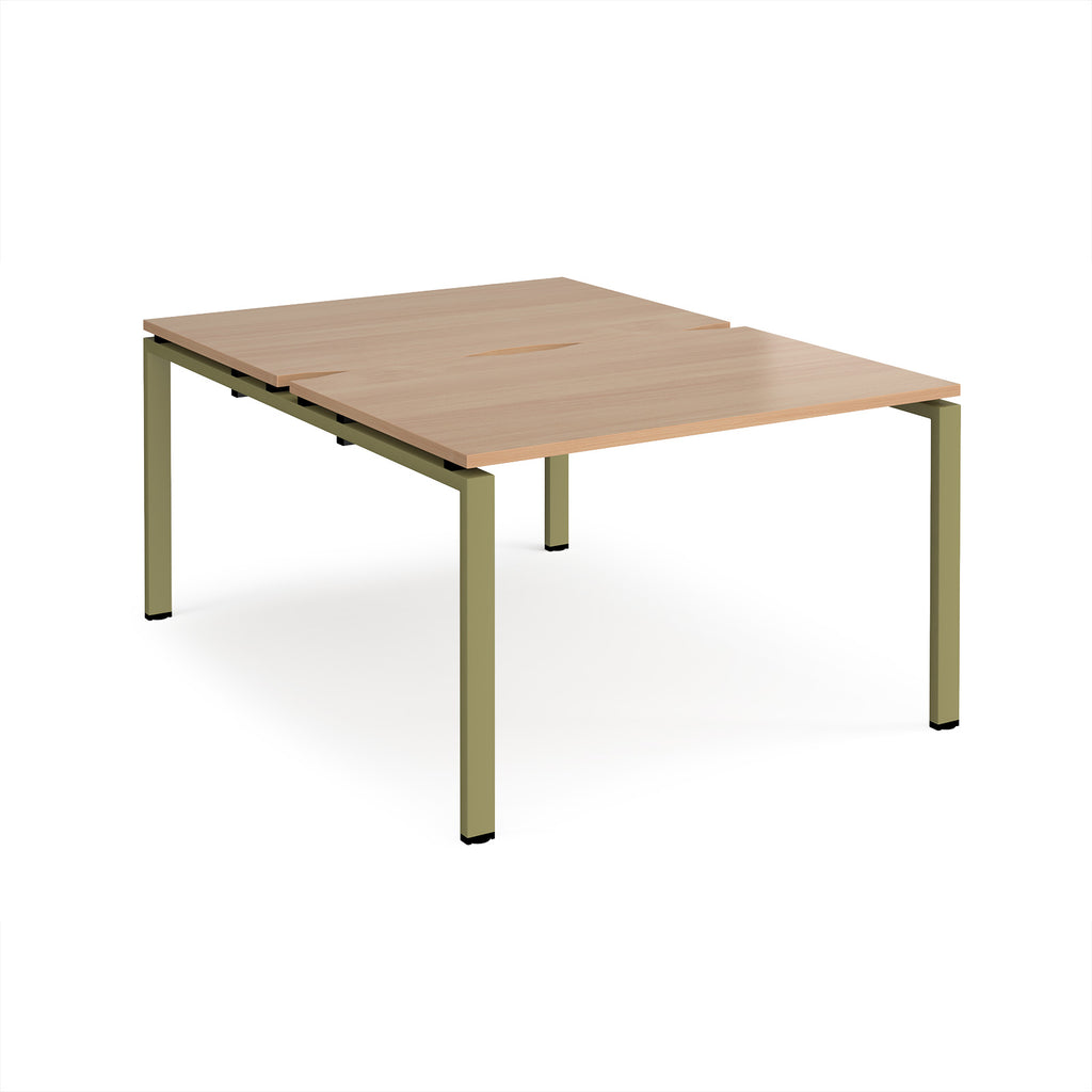 Back-to-back desk with wood-effect top and green metal frame on a white background