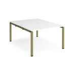 Back-to-back desk with white top and green metal frame on a white background
