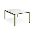 Back-to-back desk with white top with black edges and green metal frame on a white background