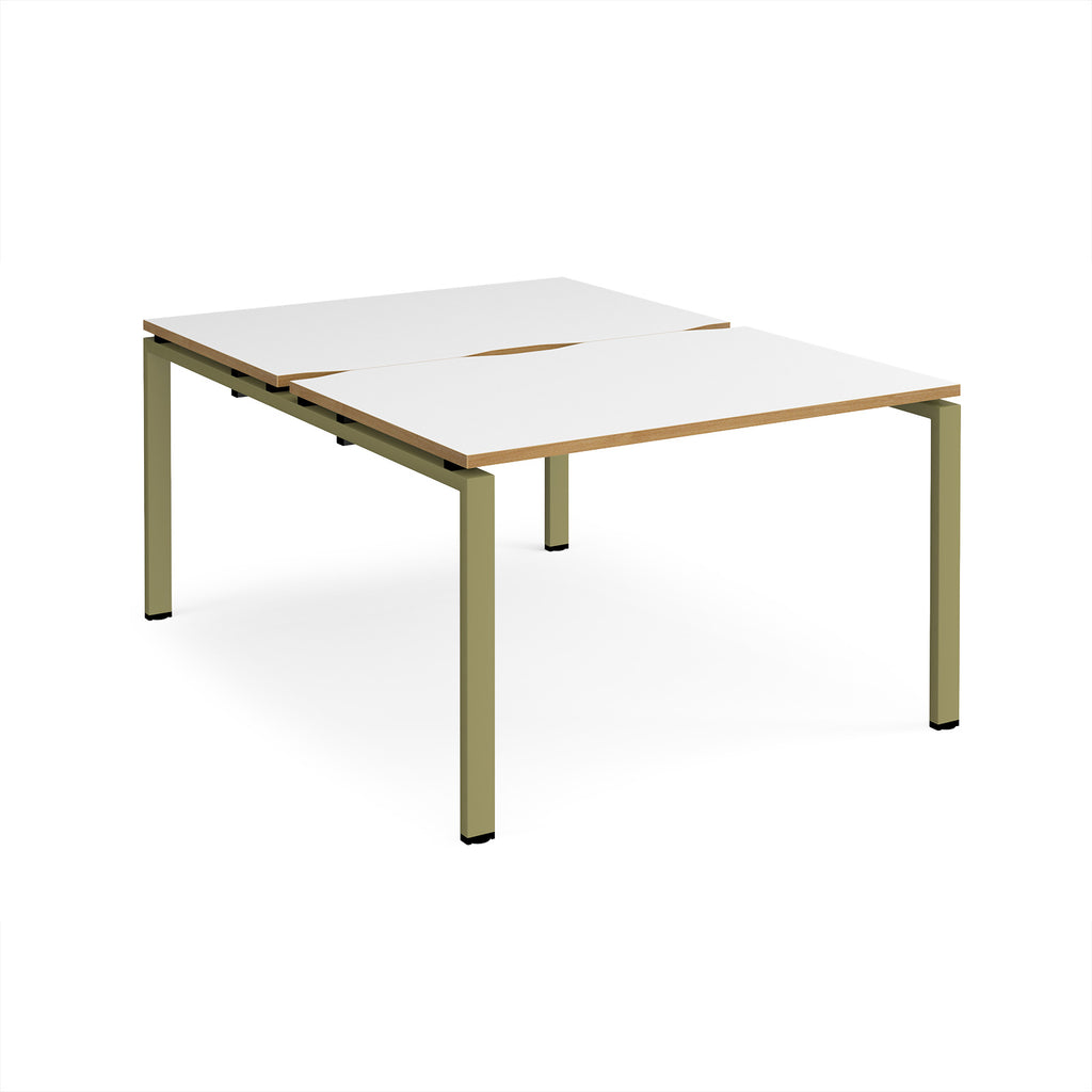 Back-to-back desk with white top with wooden edges and green metal frame on a white background