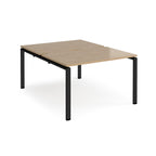 Back-to-back desk with wood-effect top and black metal frame on a white background