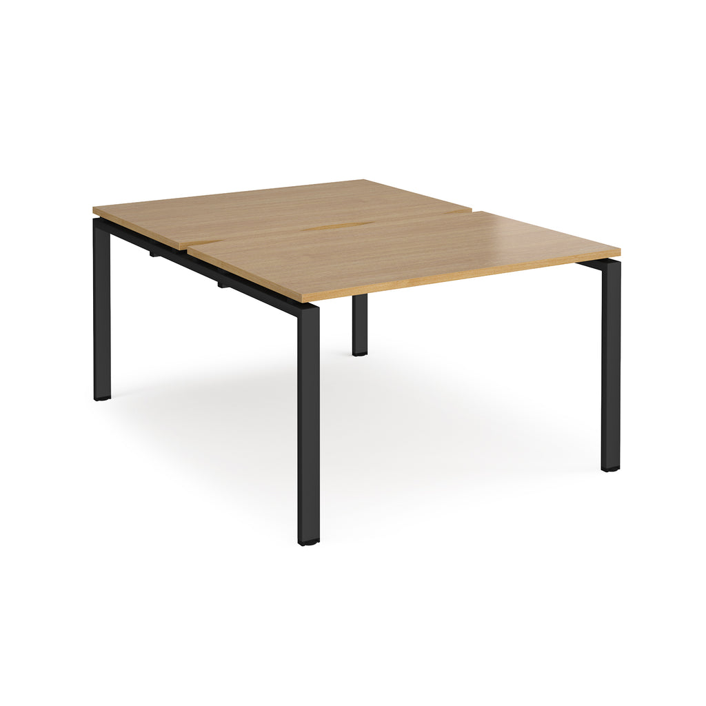 Back-to-back desk with wood-effect top and black metal frame on a white background