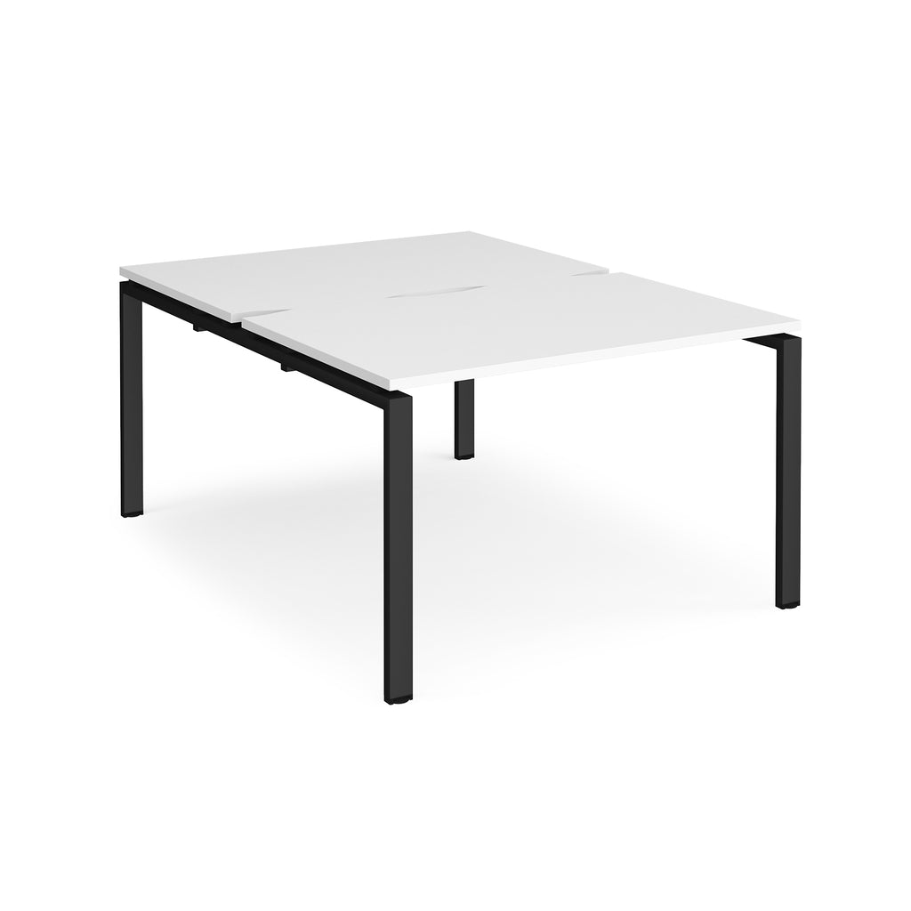 Back-to-back desk with white top and black metal frame on a white background