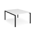 Back-to-back desk with white top and black metal frame on a white background