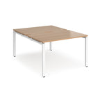 Back-to-back desk with wood-effect top and white metal frame on a white background