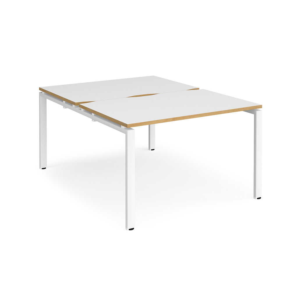 Back-to-back desk with white top with wooden edges and white metal frame on a white background
