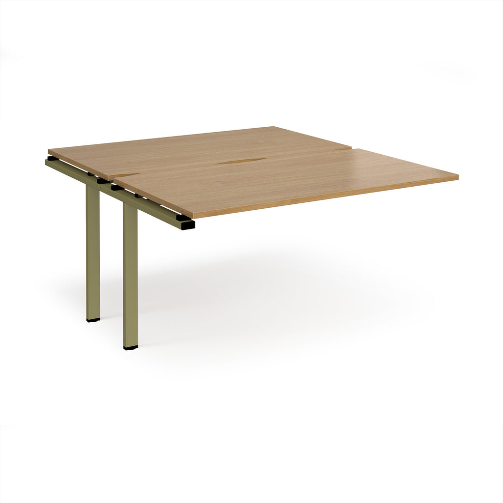 Desk add-on unit with wood-effect top and green metal frame on a white background
