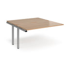 Desk add-on unit with wood-effect top and silver metal frame on a white background