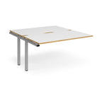 Desk add-on unit with white top with wooden edges and silver metal frame on a white background