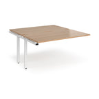 Desk add-on unit with wood-effect top and white metal frame on a white background