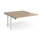 Desk add-on unit with wood-effect top and white metal frame on a white background