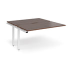 Desk add-on unit with wood-effect top and white metal frame on a white background