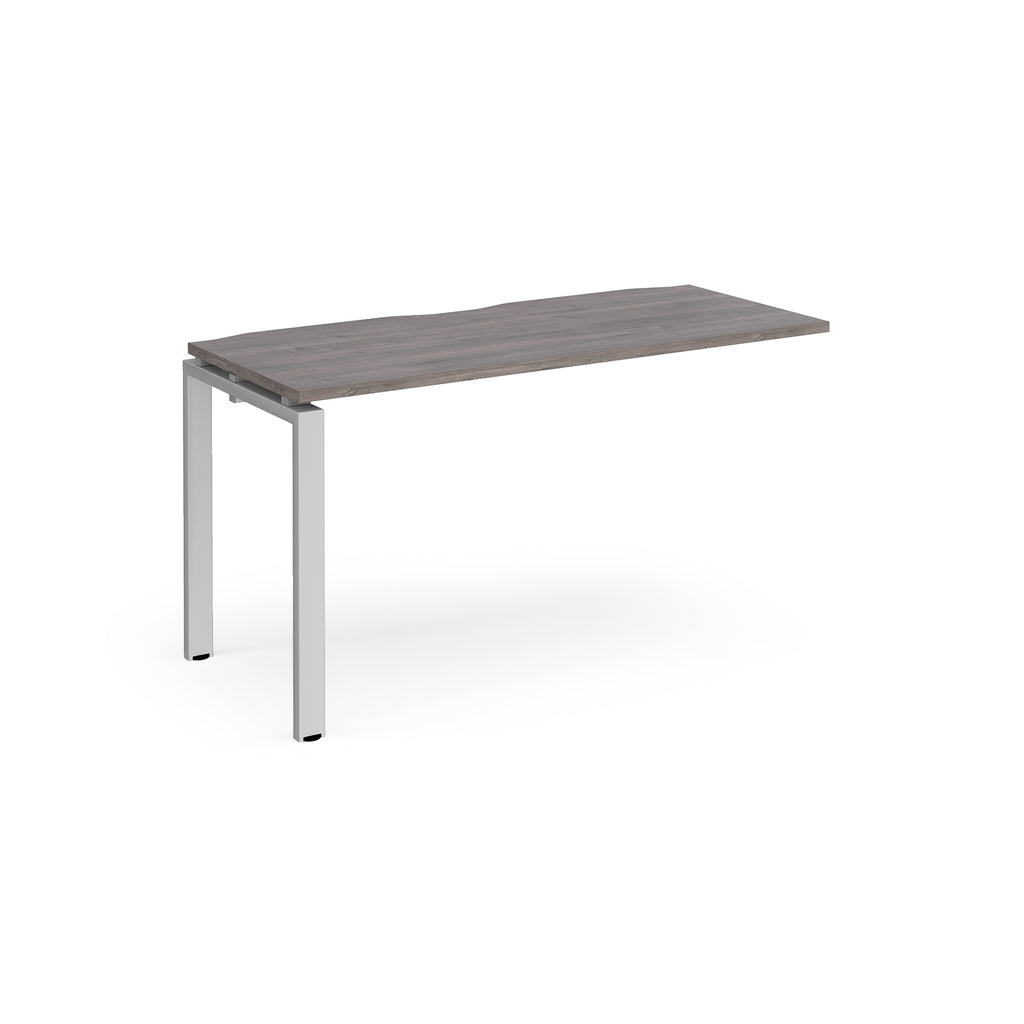 Desk add-on unit with grey wood-effect top and silver metal frame on a white background