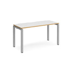 Rectangular table with white top and wooden edge with silver metal frame on a white background
